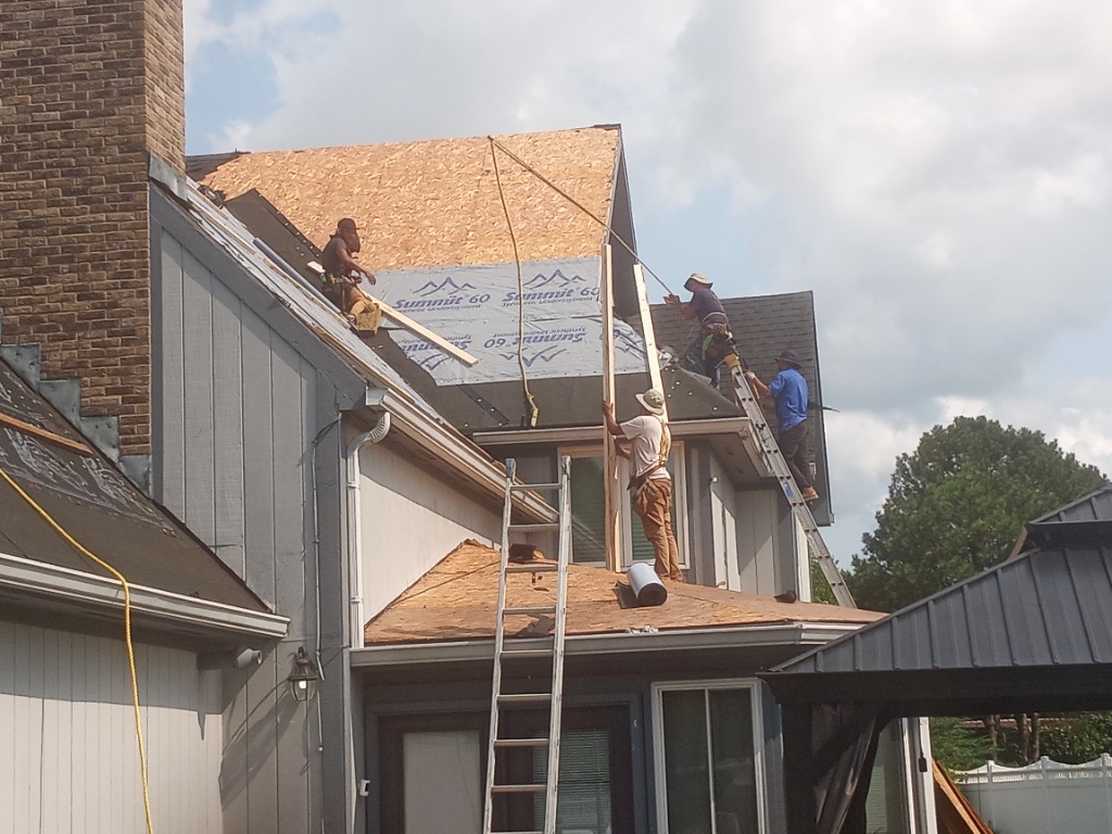 Steep roof replacement in progress