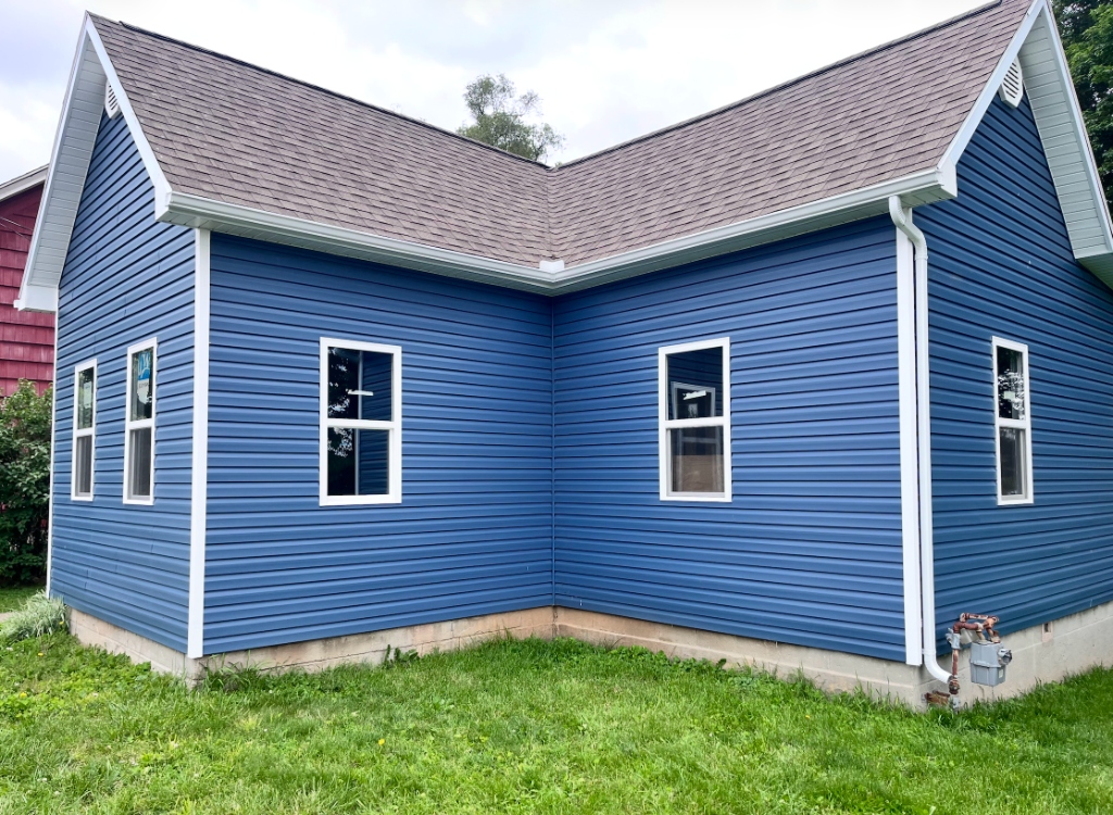 Blue siding installation project